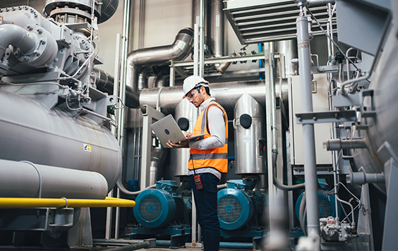 Engineer working in industrial warehouse